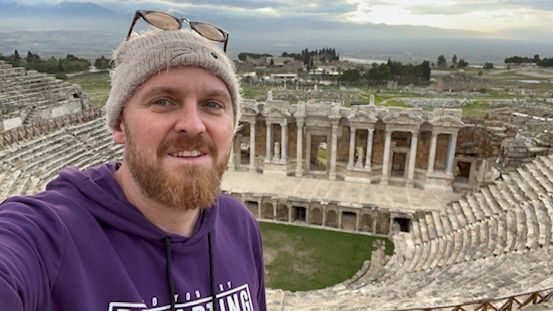 Eric Nielson at the top of the ancient theater of Hierapolis above Pamukkale, Turkey